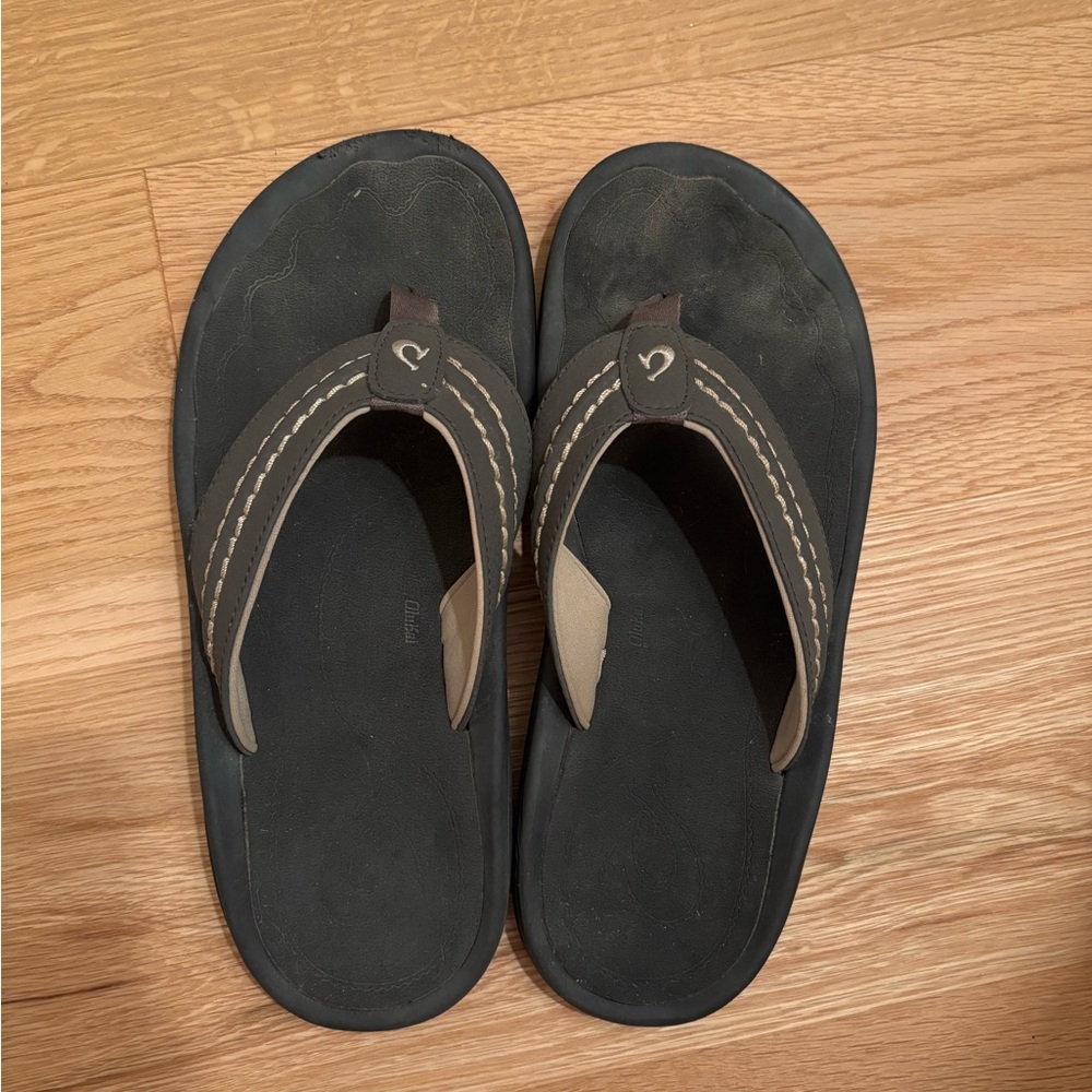 OluKai Black and Brown Flip-Flops
